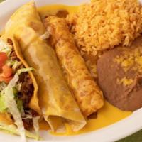 Tex Mex Dinner · Taco al carbon topped with chili con queso, crispy beef taco, and a cheese enchilada. Served...