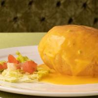 The Original Puffy Queso · Los Tios famous puffy crispy shell smothered with house made chile con queso.