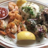 Shrimp & Crab Leg Platter · A pound of steaming boiled shrimp and three crab clusters, andouille sausage, new potatoes, ...