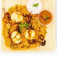 Egg Biryani · Authentic hyderabadi dum biryani cooked w/eggs, spices, premium basmathi rice, garnished w/ ...