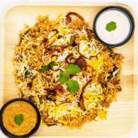 Vegetable Biryani · Rich & exotic dish cooked w/ mixed vegetables, spices & saffron flavored basmathi rice.