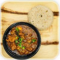 Goat Curry · Tender Baby Goat curry cooked with assorted spices
Served with Rice Pilaf