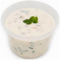 Raitha 16Oz · Side dish made of dahi(yogurt) and raw vegetables(cucumber, carrots, onions).