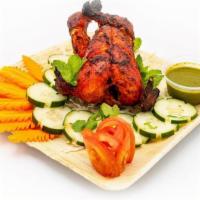 Tandoori Chicken · Grilled Whole Chicken marinated with spices & served with mint chutney