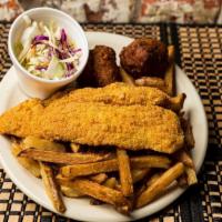 Catfish Dinner · Fresh, cornmeal coated by hand and deep fried
served with hush puppies, Cole slaw, and house...