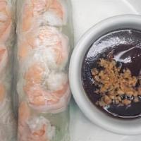 Shrimp Spring Rolls (2) · Spring rolls are cylindrical, fresh delicate rolls with shredded lettuce, vermicelli and sli...
