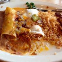 Cheese Enchiladas · Three cheese enchiladas with chile con carne, Mexican rice and refried beans.
