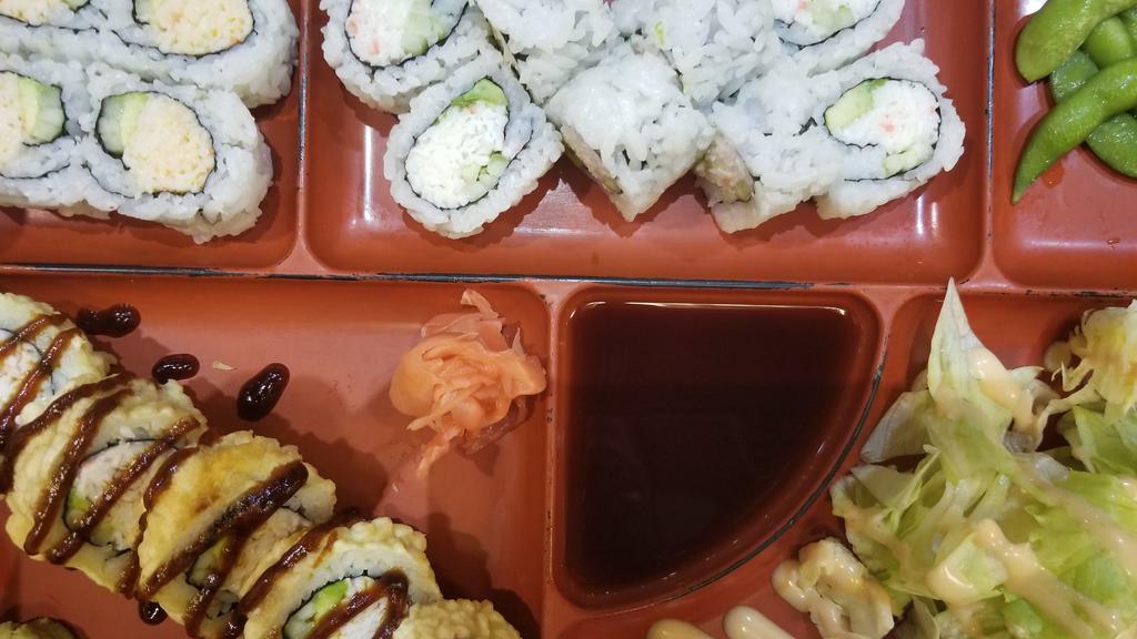 Roll Bento · Spicy. 8 pcs. California roll, 4 pcs. Spicy crab roll, 4 pcs. Deep fried roll, edamame, salad and miso soup.