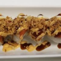 Spicy Crunch Roll · Spicy. Tempura shrimp, crab meat, avocado and cucumber topped with spicy tuna and crumbs.