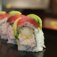 Geisha Roll · Shrimp tempura, crab, topped with tuna and eel, spicy mayo, wasabi mayo, hot sauce