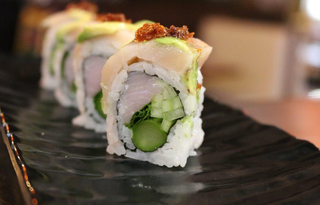 Anaconda Roll · Yellowtail,asaparagus,avocado,cilantro topped with albacore tuna dressed with ponzu sauce and fried garlic