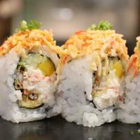 Amazing Spider Roll · Mango, soft shell crab, crab meat, cucumber, avocado topped with spicy crab meat and yuzu sa...