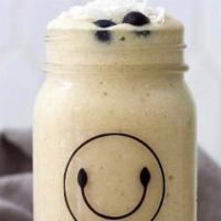 Overnight Oat · Steel cut oats soaked overnight in almond milk, topped with banana, blueberries, strawberrie...