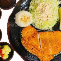 Pork Tenderloin Katsu · Pork tenderloin Katsu.
Served with Cabbage salad, Rice, and Fruit Sando.