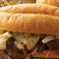 Tex-Mex Cheesesteak Sandwich · Hoagie, steak with queso, olives and banana pepper.
