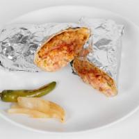 Chavez Burrito · Filled with rice, beans your choice of meat and lettuce, tomato, sour cream and cheese.