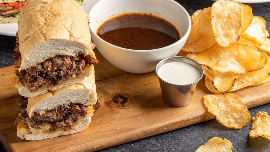 French Dip · French roll, prime rib, arugula, shaved parmesan, horseradish cream, au jus served with russet chips