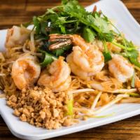 Pad Thai · Traditional thick Thai rice noodles stir-fried in a tangy sauce with eggs, tofu, bean sprout...