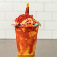 Mangonada With Mix Candies · gummy bears, sour belts,tamarindo stick, and Lucas skwinkles.