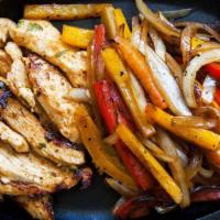 Chicken Fajitas · 2 Large fajitas - marinated smoked chicken, onions, bell peppers.
This plate comes with Span...