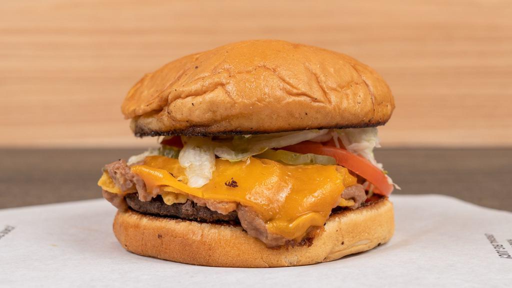 Beanburger · Refried beans, Fritos, and Cheddar cheese piled on our Original Big Juicy burger. Includes mayo, mustard, lettuce, tomato, pickle, and onion.