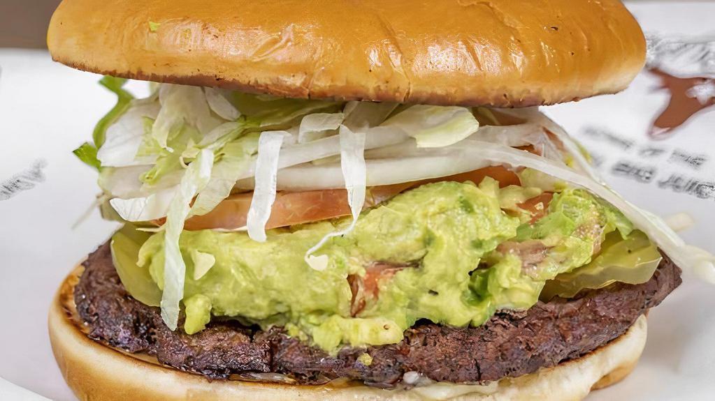 Guacamole Burger · Topped with a generous scoop of homemade guacamole. Includes mayo, mustard, lettuce, tomato, pickle, and onion.
