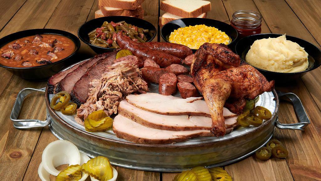 Big Pig Out · Feeds 6-8
½ lb of brisket
½ lb of turkey
1 lb of sausage
1 lb of pulled pork
WHOLE chicken
4 pint-size sides
FULL loaf of bread