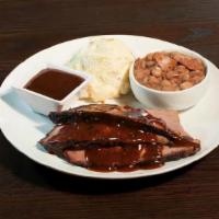 One Meat Plate · Choice of chicken, pulled pork, turkey or sausage