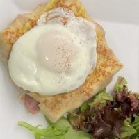 Croque Madame Crepe · Chef recommended. An over easy egg, ham, Swiss cheese, dijon mustard, topped with a house ma...