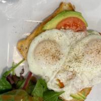 Avocado Toast · Most popular. Avocado topped with sliced tomatoes and two over easy egg with fresh cracked p...