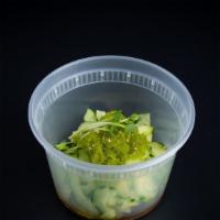 Cucumber Sunomono With Wasabi Tobiko · wasabi tobiko, sliced cucumber, light soy vinegar, sesame seeds, radish sprouts