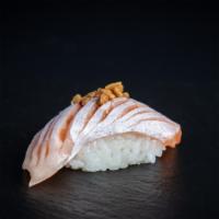 Salmon Toro Sushi 1Pc · salmon belly, rainbow sea salt, garlic chips
@Consuming raw or undercooked meats, poultry, s...