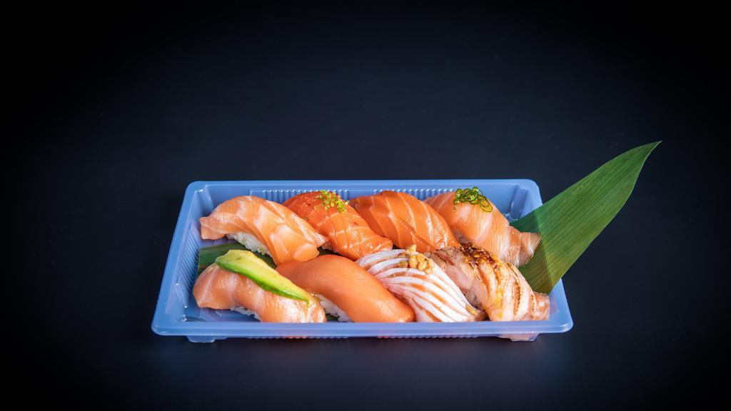 8 Pcs Salmon Sushi Sampler · 1pc each of salmon, miso salmon, salmon toro, salmon chili, aburi salmon, smoked salmon, avo-salmon and chef' choice