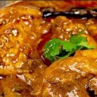 Chicken Curry · Chicken cooked with special sauce.