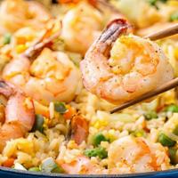 Shrimp Fried Rice · Flavored basmati rice cooked with shrimp, egg and vegetables.