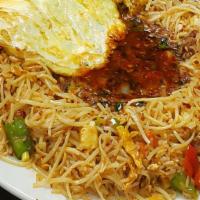 Combo Triple Rice · Lip-smacking Indo Chinese dish prepared with a combination of noodles, rice, vegetables, and...