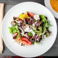 Mixed Green Salad · Mixed greens, red onions, tomatoes, feta, carrots, balsamic vinaigrette.