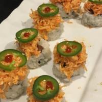 Panic Roll · Spicy Tuna, Cucumber, wrapped around with Seaweed & Rice & Sesame Seed, topped with Spicy Cr...