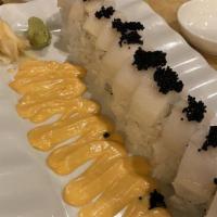 White Tiger Roll · Boiled Shrimp, Crabmeat, Avocado, wrapped around with Seaweed & Rice & Sesame Seed, topped w...