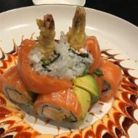 Tango Roll · Two Shrimp Tempuras, Crabmeat, wrapped around with Seaweed & Rice & Sesame Seed, topped with...
