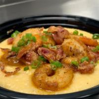 Shrimp N' Grits​ · The Shrimp N' Grits, include a base of cheese grits with fresh made to order Cajun shrimp, t...