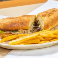 Philly Cheese Steak Sandwich · Philly meat sautéed with bell pepper, onions, mushrooms, our special seasoning, & topped...