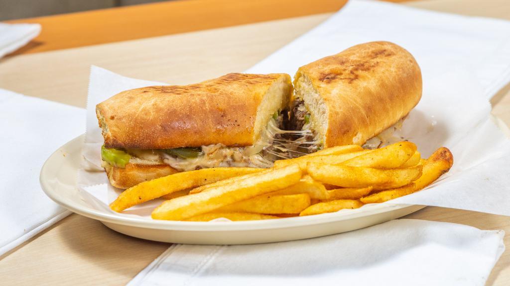 Philly Cheese Steak Sandwich · Philly meat sautéed with bell pepper, onions, mushrooms, our special seasoning, & topped with mozzarella cheese.