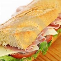 *Ham & Cheese Sub · *Made on our freshly baked 8” long italian hoagie roll and prepared with fresh lettuce, toma...