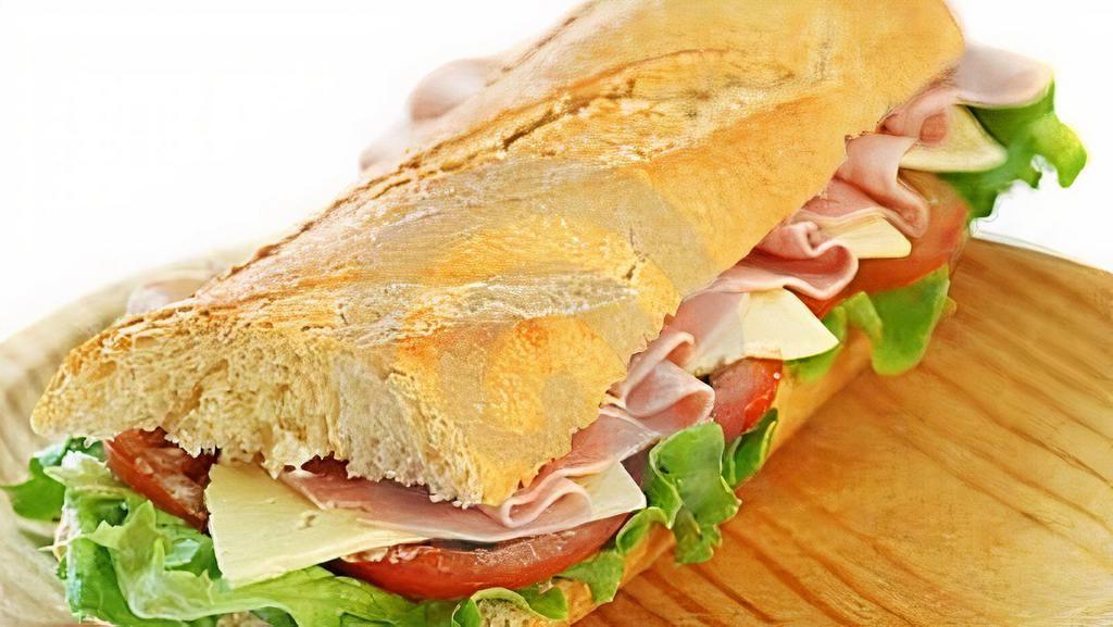 *Ham & Cheese Sub · *Made on our freshly baked 8” long italian hoagie roll and prepared with fresh lettuce, tomatoes, onions, pickles, banana peppers, and cheese & dressed with either mayonnaise, mustard, italian house, or ranch.