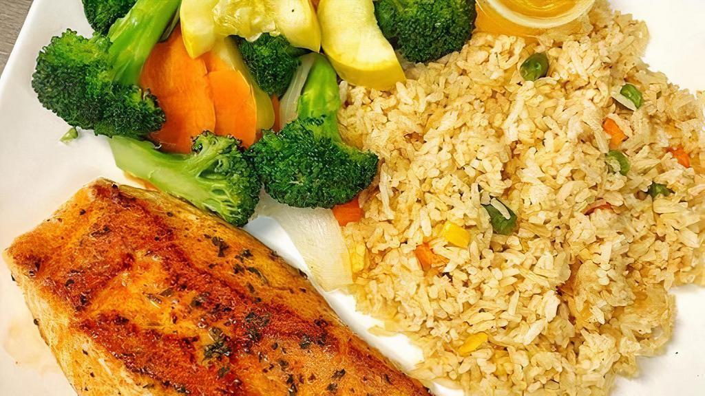 Grilled Salmon · served w Fried rice, Steam vegetables & salad