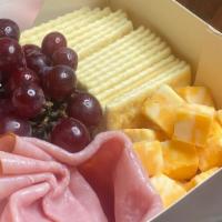 Adult Lunchable  · An American childhood classic, with an adult twist. Comes with your choice of deli meat, cub...
