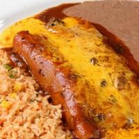 Texanas · Two cheese or beef enchiladas topped with our homemade chile con carne sauce and Cheddar che...