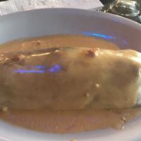Jerry'S Burrito · A large flour tortilla wrap filled with shredded or ground beef, refried beans, rice, cheese...