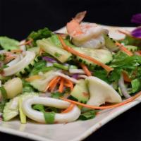 Seafood Salad · Lettuce, tomatoes, red onion, cilantro, cucumber, tossed in Our Sauce.